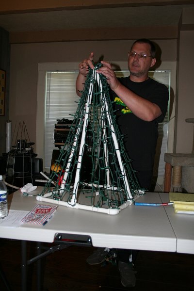 IMG_1809.JPG - John with his version of mini trees