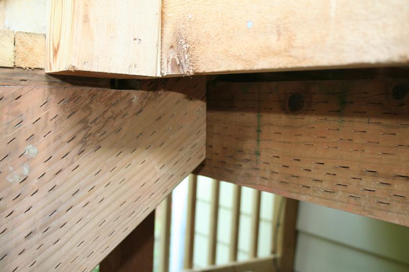 IMG_1728.JPG - Stair riser held in place with screws
